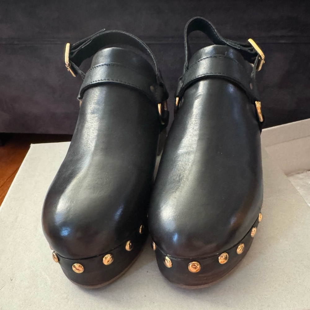 Stylish Black Clogs with Gold Accents